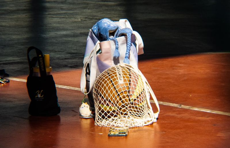 Close up of sports equipment in a dark room.