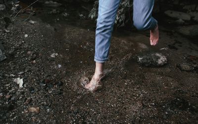 Motion blur of a person jumping in place.